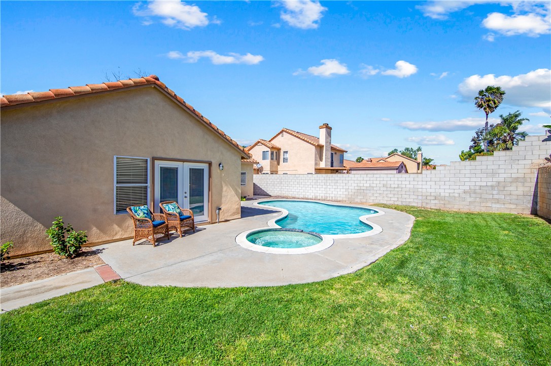 9146 Rangpur Circle Riverside, CA 92508 - Photo 1 of 52 a view of a house with backyard and sitting area
