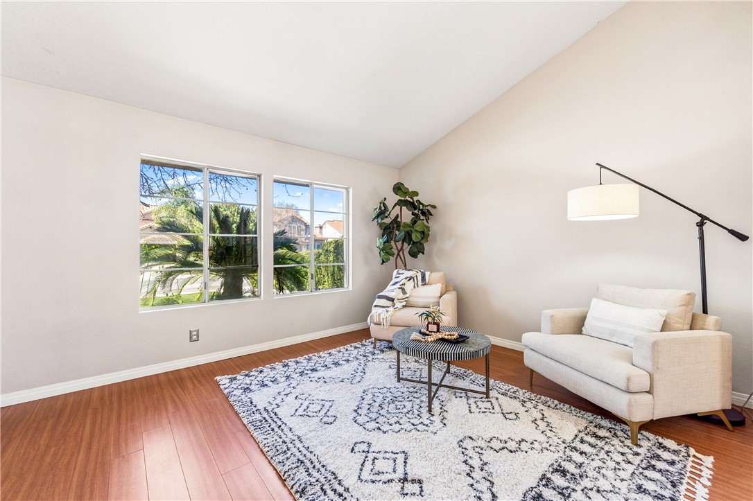 9146 Rangpur Circle Riverside, CA 92508 - Photo 11 of 52 a living room with furniture and a window