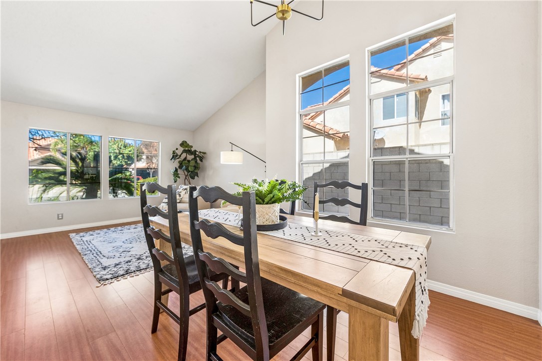 9146 Rangpur Circle Riverside, CA 92508 - Photo 14 of 52 a dining room with furniture and wooden floor
