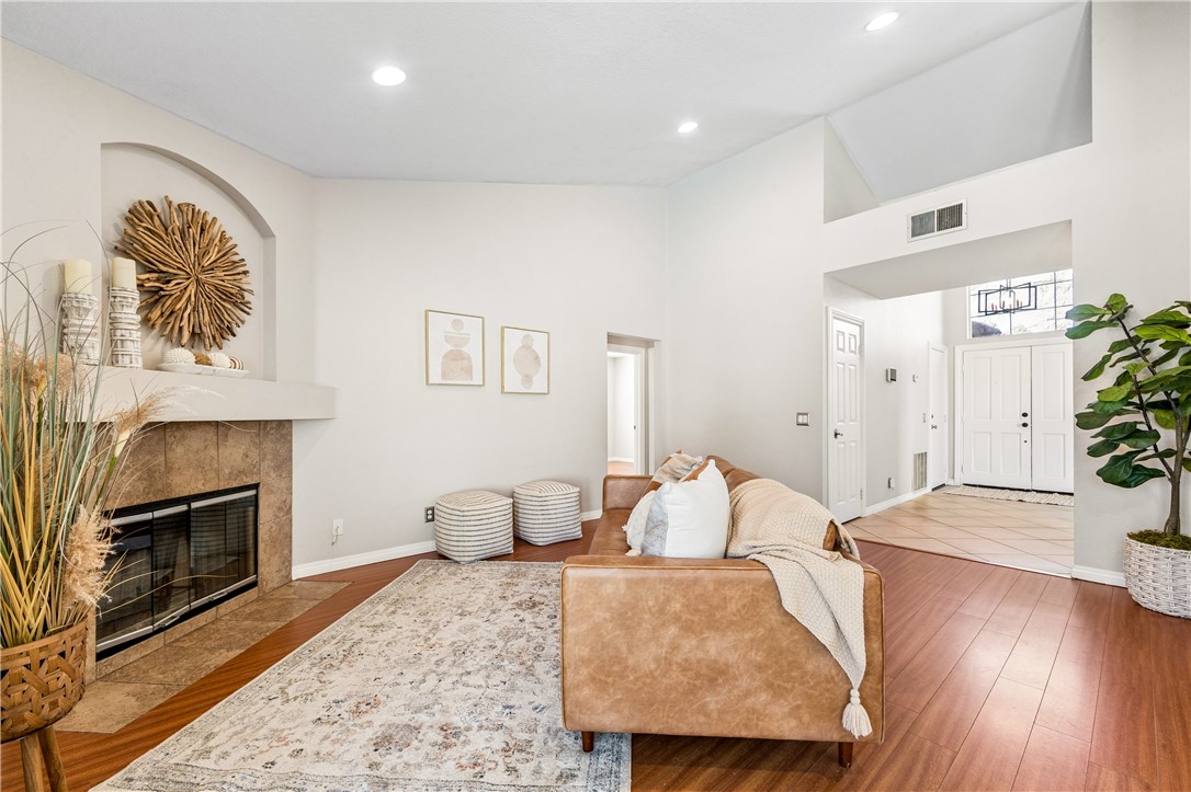 9146 Rangpur Circle Riverside, CA 92508 - Photo 17 of 52 a living room with furniture and a fireplace