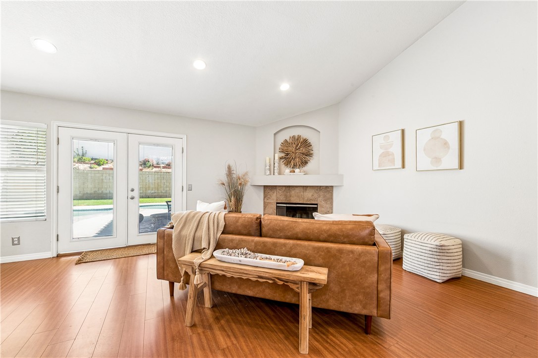 9146 Rangpur Circle Riverside, CA 92508 - Photo 18 of 52 a living room with furniture and a wooden floor