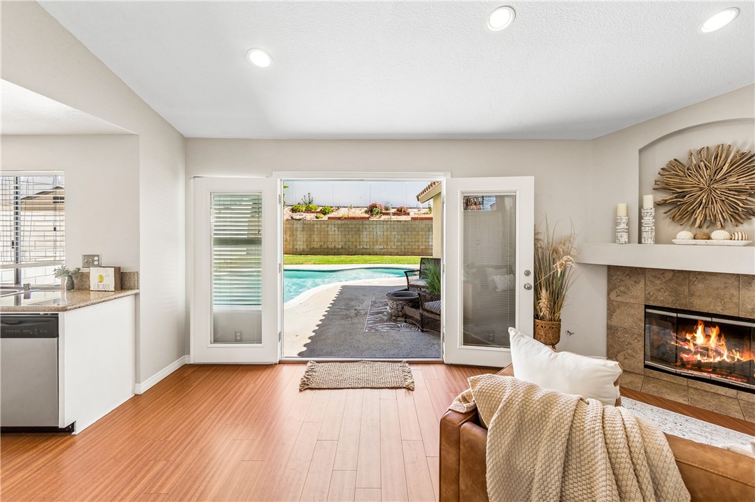 9146 Rangpur Circle Riverside, CA 92508 - Photo 2 of 52 a living room with furniture and a fireplace