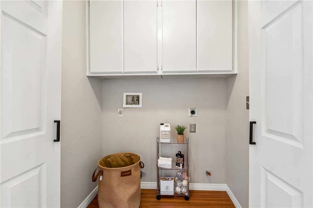 9146 Rangpur Circle Riverside, CA 92508 - Photo 29 of 52 a view of storage and utility room with washer and dryer