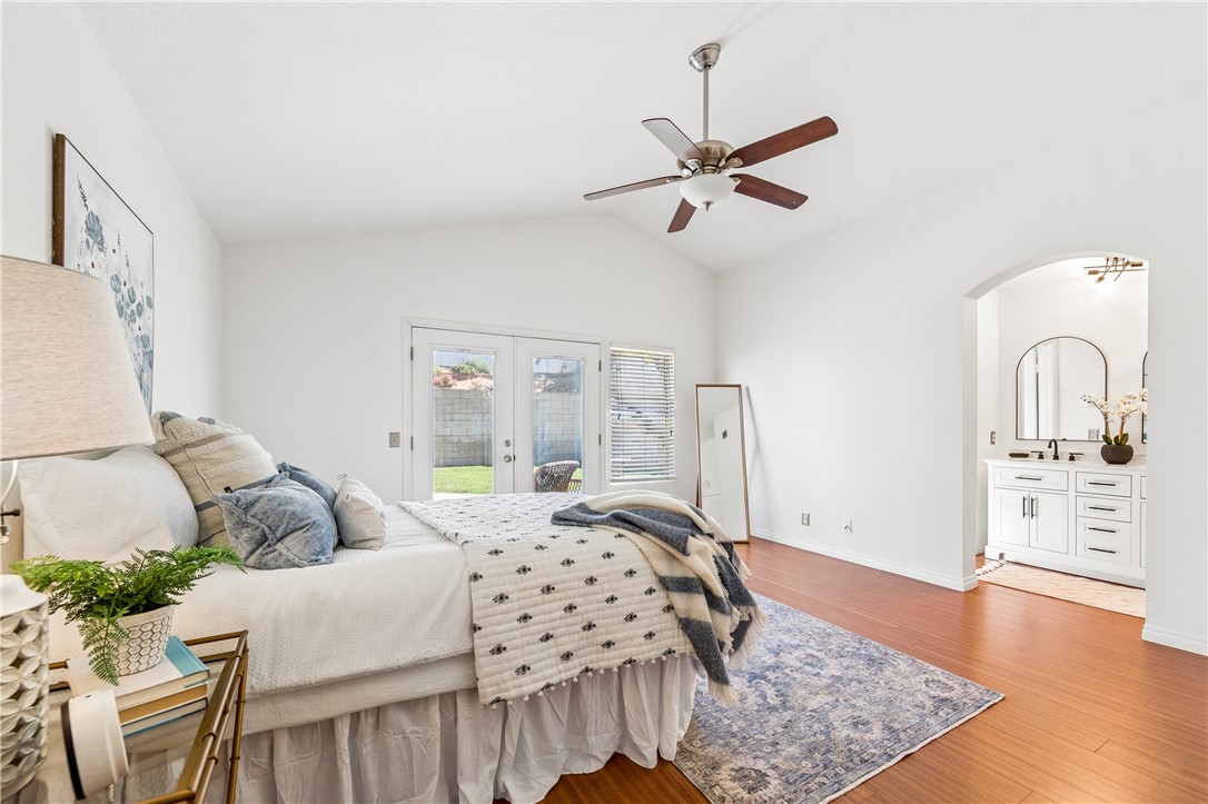 9146 Rangpur Circle Riverside, CA 92508 - Photo 33 of 52 a bedroom with furniture and wooden floor