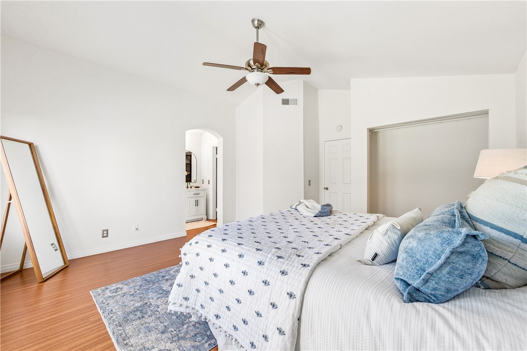 9146 Rangpur Circle Riverside, CA 92508 - Photo 34 of 52 a bedroom with a bed and a rug