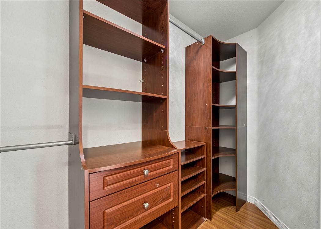 9146 Rangpur Circle Riverside, CA 92508 - Photo 39 of 52 a view of walk in closet with clothes and shoes