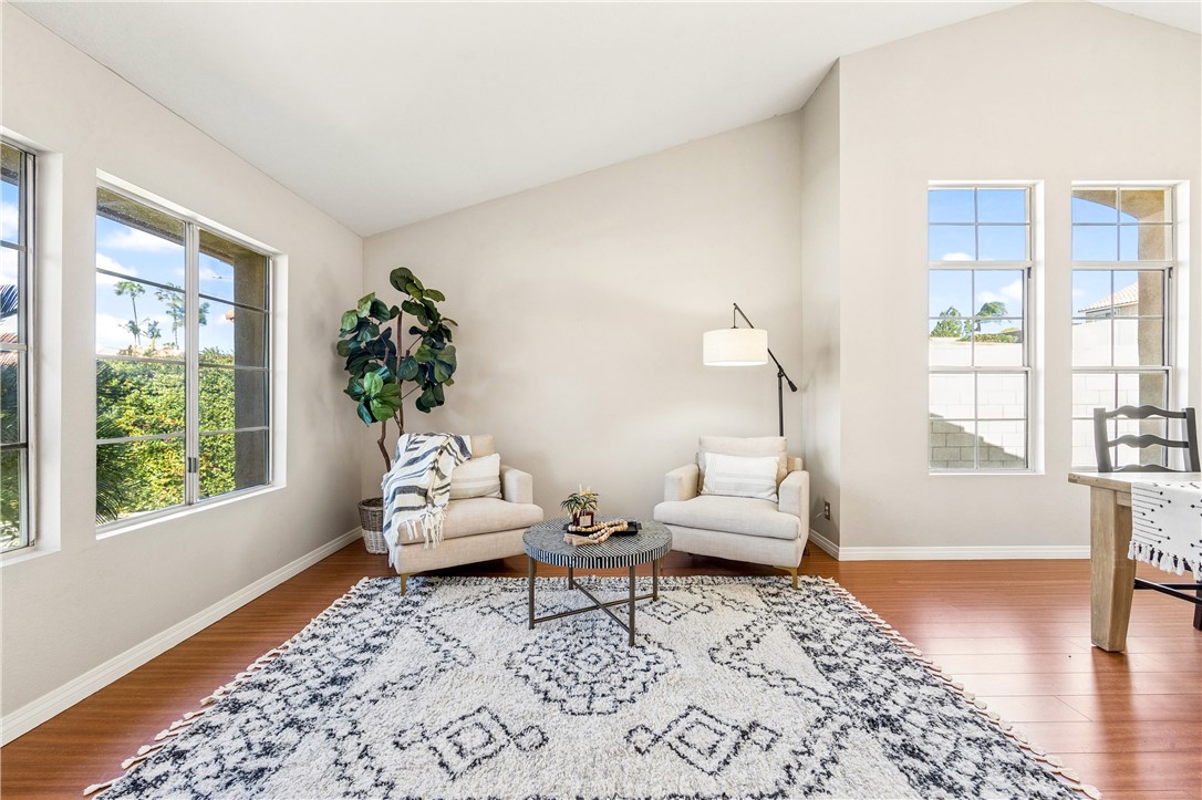 9146 Rangpur Circle Riverside, CA 92508 - Photo 10 of 52 a living room with furniture and wooden floor