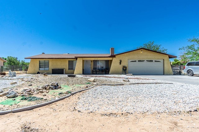 22139 Gayhead Road Apple Valley, CA 92307 - Photo 1 of 1 a front view of a house with a yard