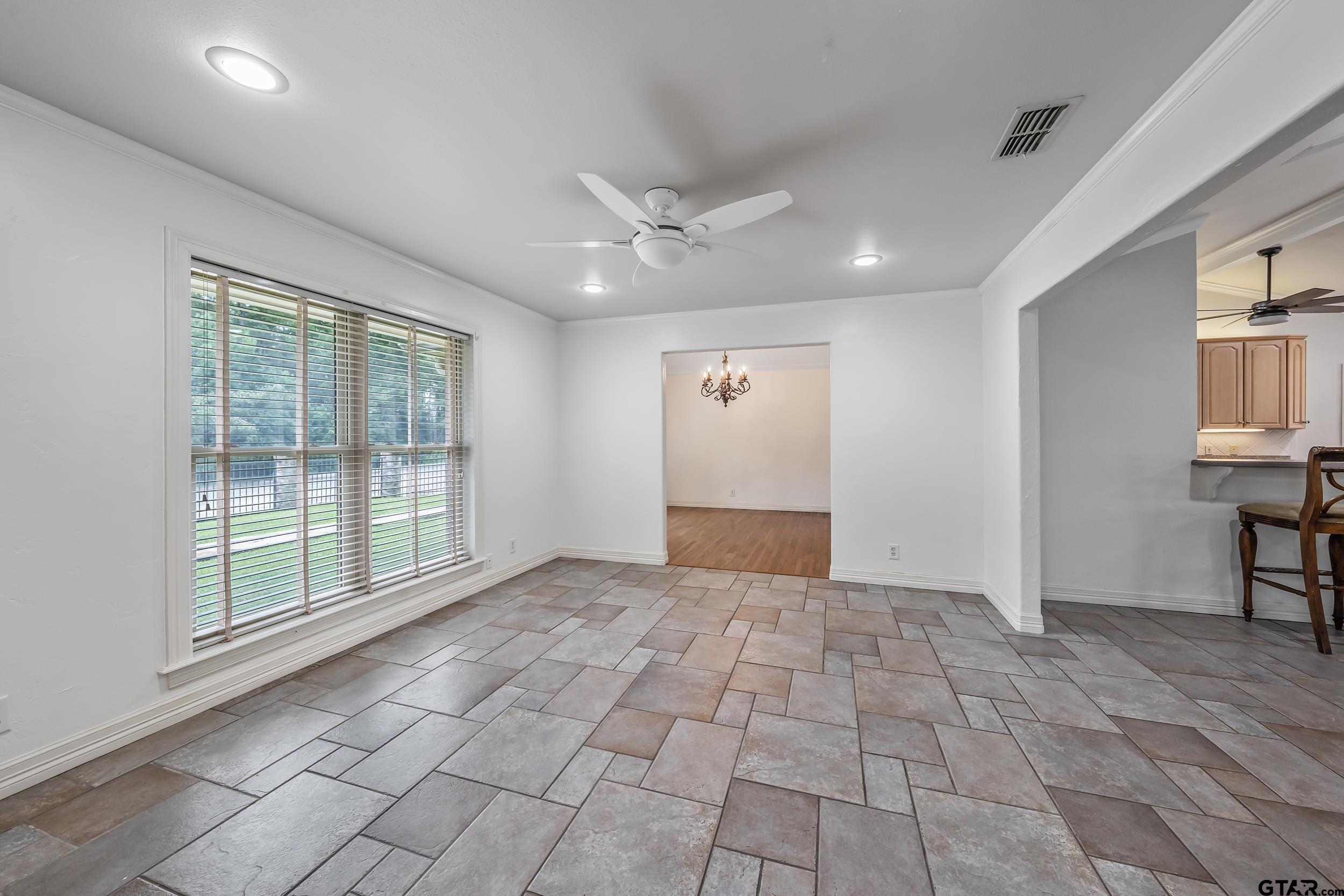 231 West Cumberland Road Tyler, TX 75703 - Photo 14 of 48 a view of an empty room with a window
