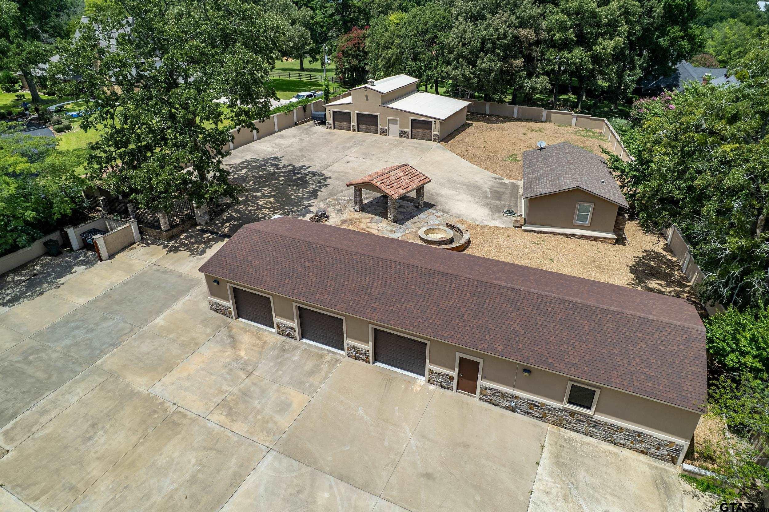 231 West Cumberland Road Tyler, TX 75703 - Photo 7 of 48 an aerial view of a house with a yard