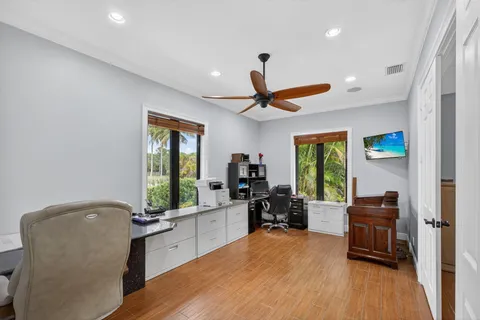 a view of a kitchen with microwave and cabinets