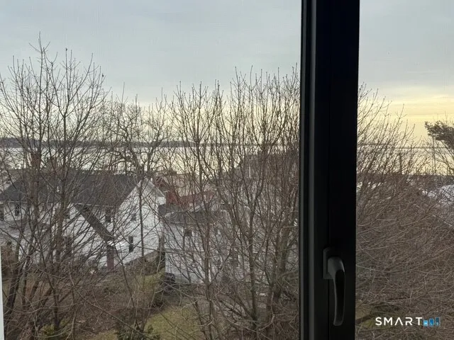 a view of a yard from a balcony