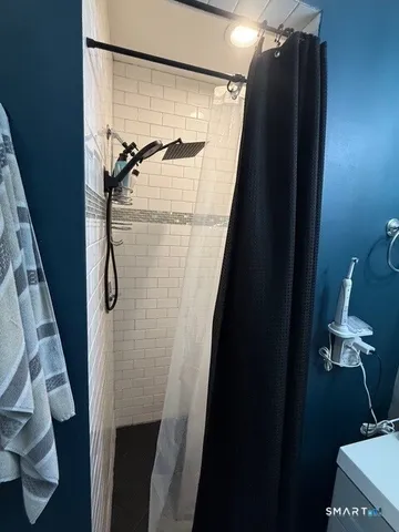 a bathroom with a toilet and a sink