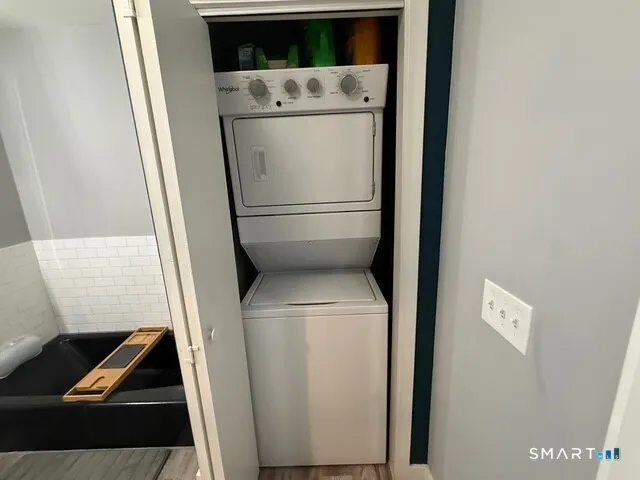a kitchen with sink and cabinets