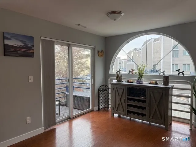 a view of room with furniture and windows