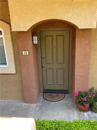a view of a house with a small garden