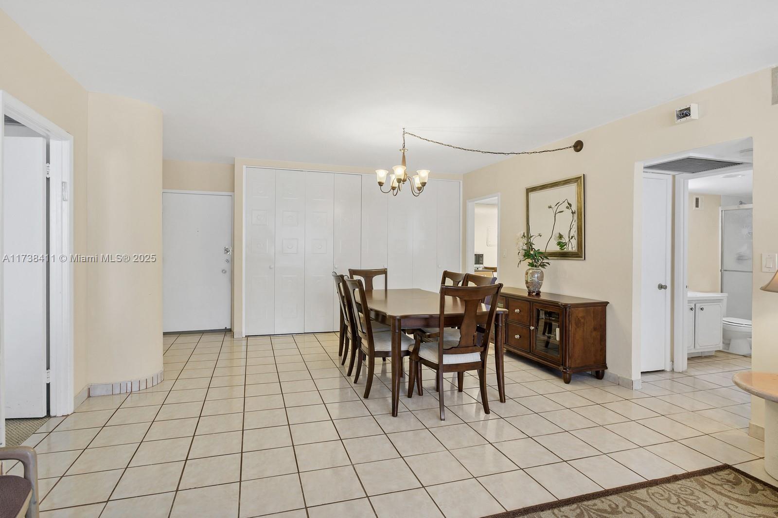 5005 Collins Avenue, Unit 724 Miami Beach, FL 33140 - Photo 5 of 15 a dining room well furnished