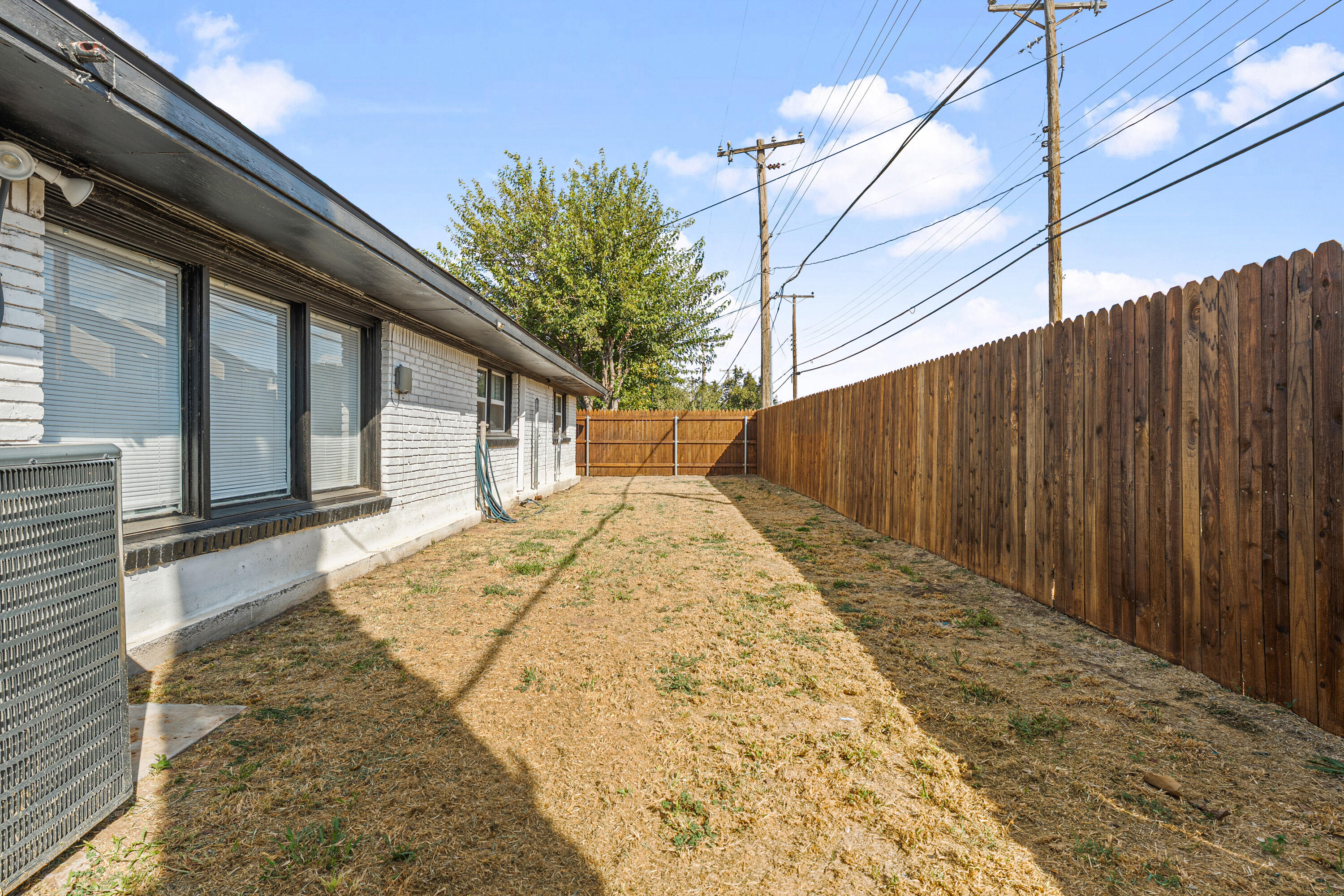 5217 9th Street Lubbock, TX 79416 - Photo 18 of 18 a view of a backyard