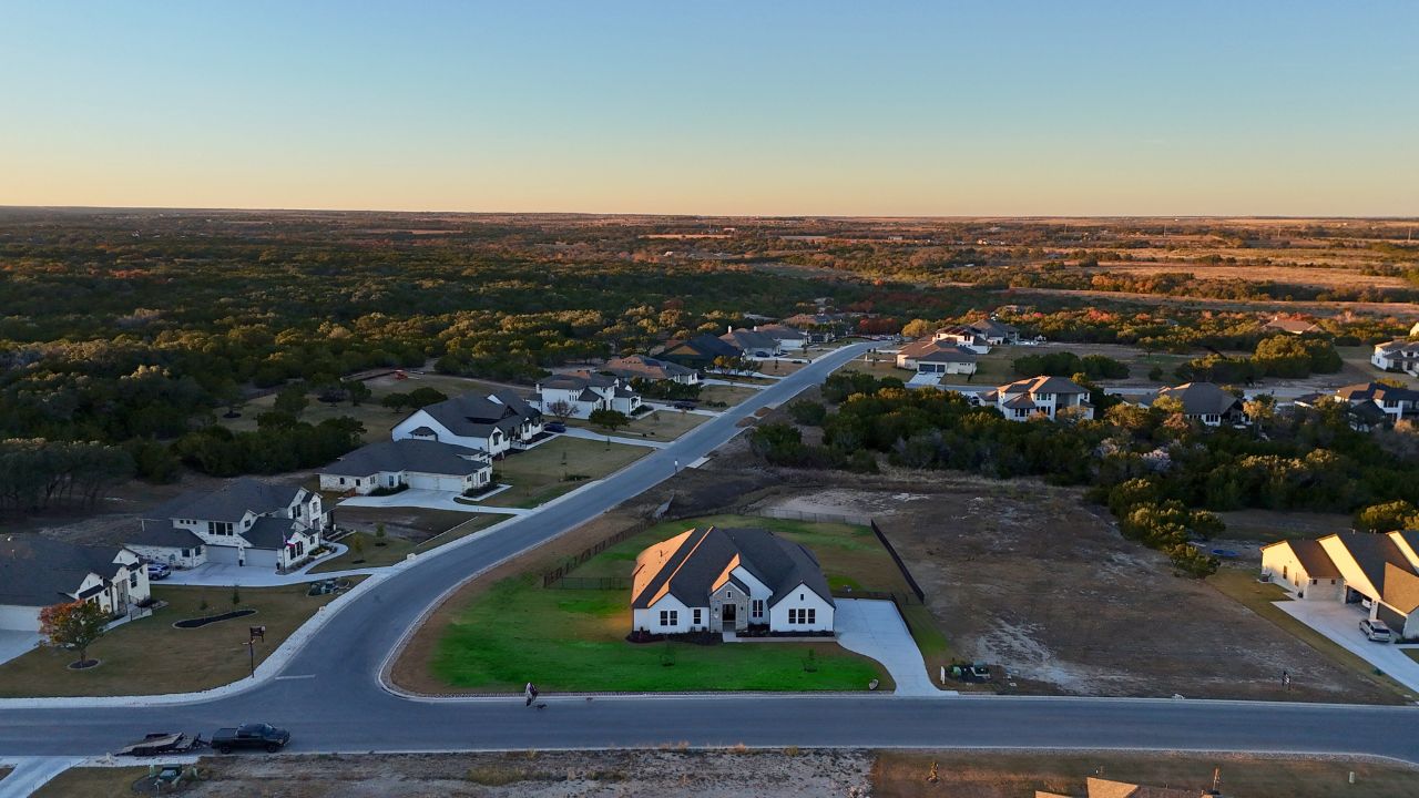 204 Rusty Colt Liberty Hill, TX 78642 - Photo 1 of 20 an aerial view of a house with outdoor space