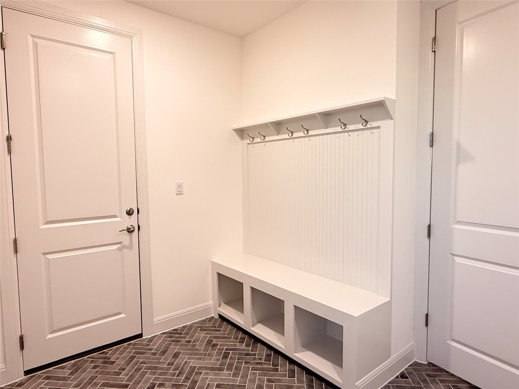 204 Rusty Colt Liberty Hill, TX 78642 - Photo 16 of 20 a room with a door and a white cabinet