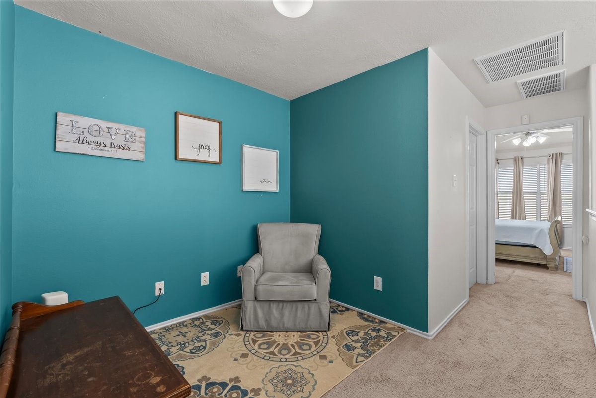 11931 Keystone Spring Way Houston, TX 77089 - Photo 16 of 34 a room with furniture and a window