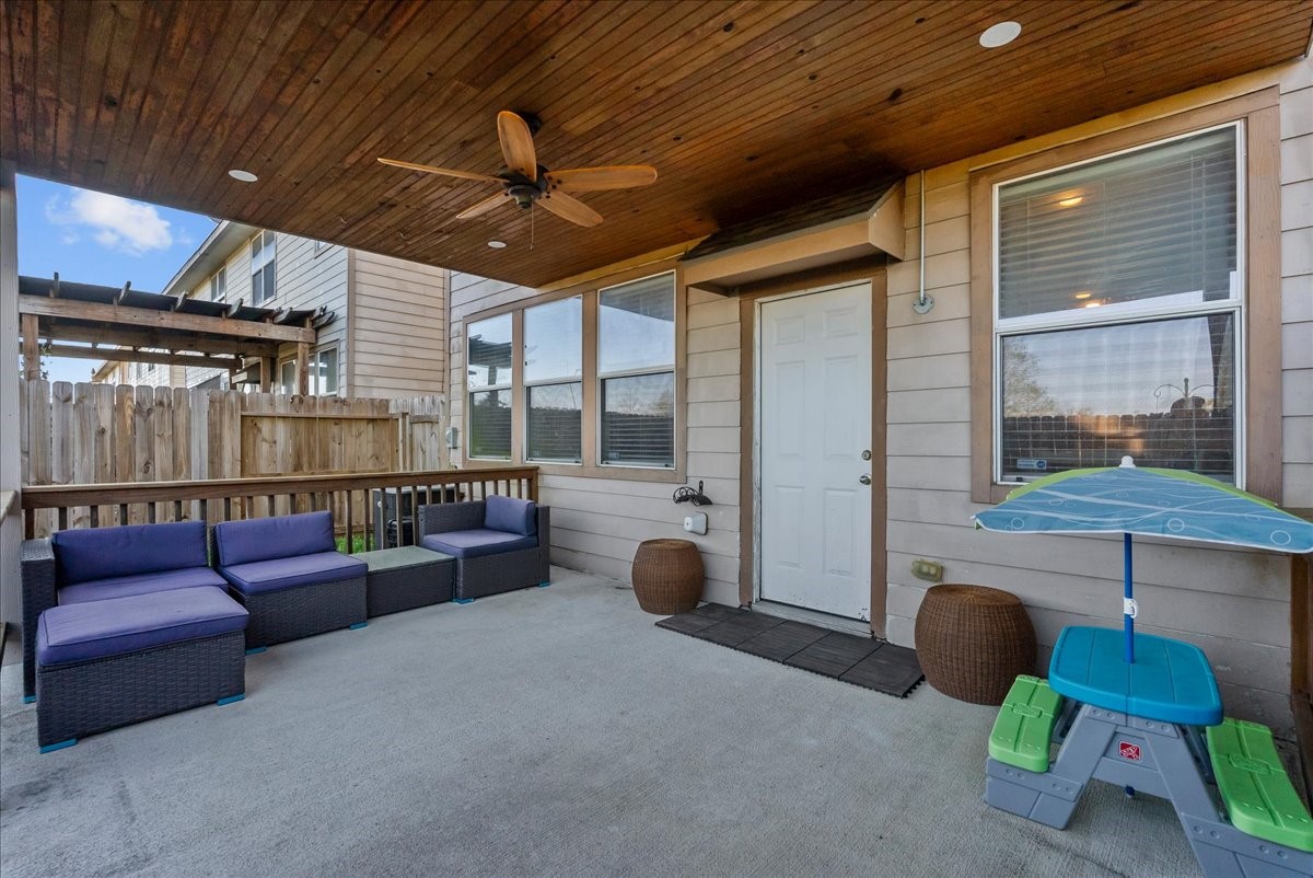 11931 Keystone Spring Way Houston, TX 77089 - Photo 29 of 34 a balcony with furniture and a potted plant