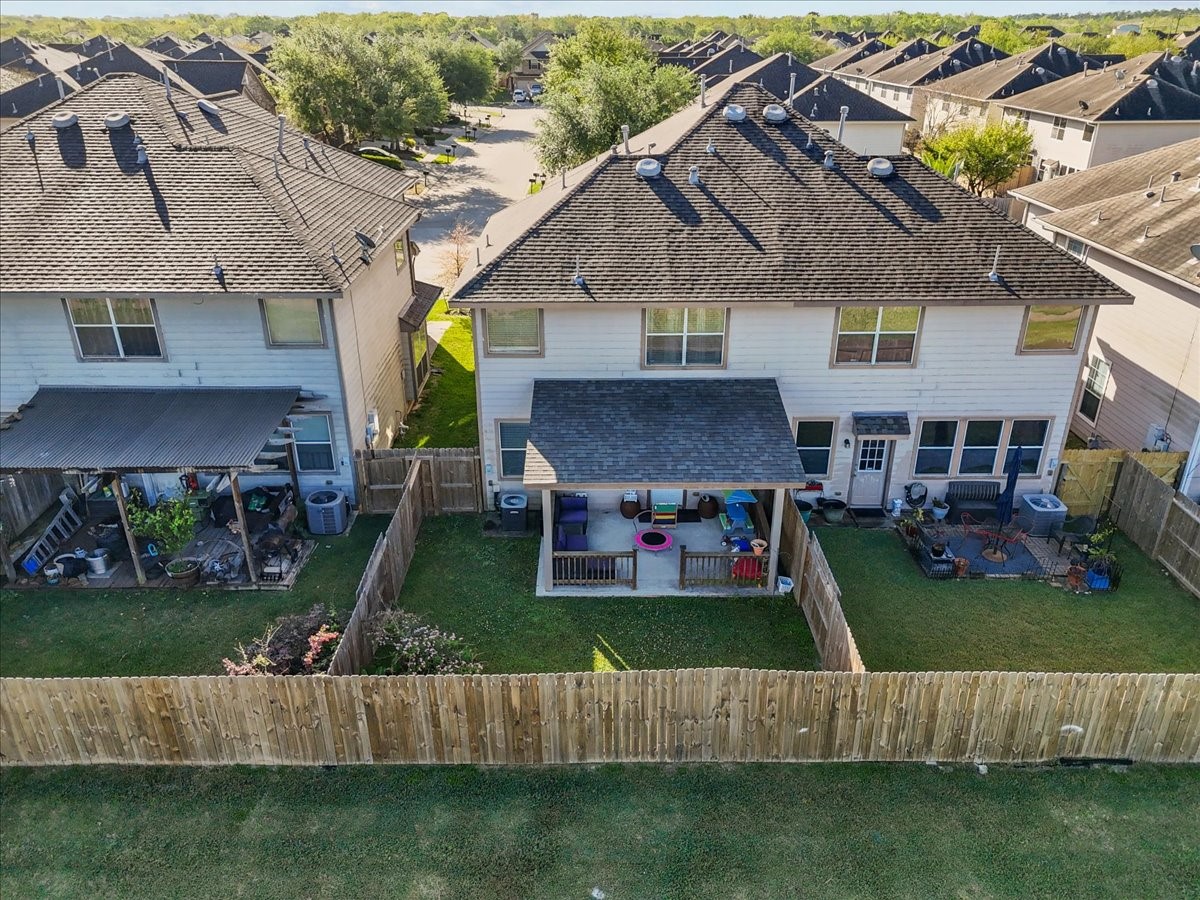 11931 Keystone Spring Way Houston, TX 77089 - Photo 32 of 34 a view of a house with a yard and sitting area