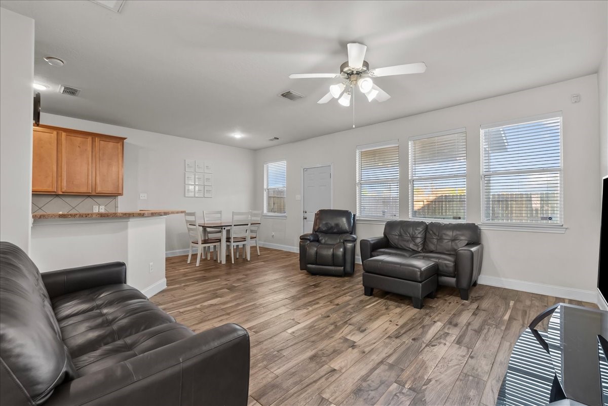 11931 Keystone Spring Way Houston, TX 77089 - Photo 6 of 34 a living room with furniture and wooden floor