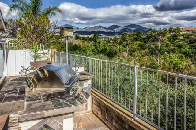 a view of balcony with furniture