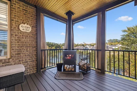 a white bath tub sitting next to a white cabinet
