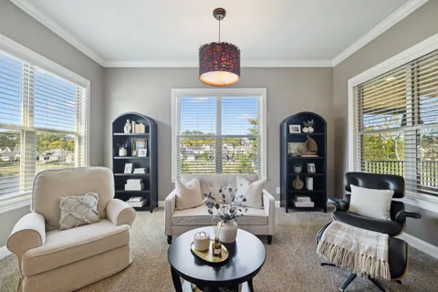 a bedroom with a bed and a cabinets