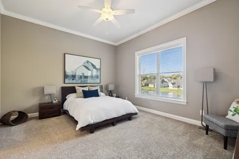 an aerial view of residential house with yard