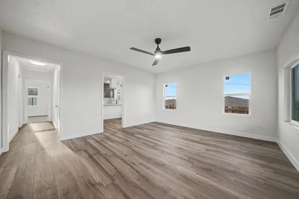 a kitchen with stainless steel appliances a refrigerator and a sink