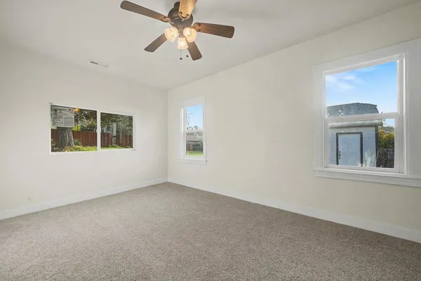 a view of a back yard of the house