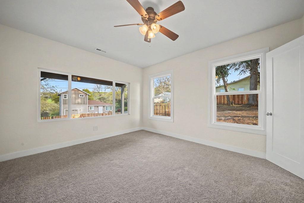 155 Foothill Drive Sutter Creek, CA 95685 - Photo 3 of 84 a view of an empty room with a window
