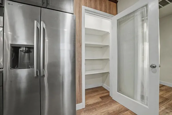 an aerial view of multiple houses with outdoor space