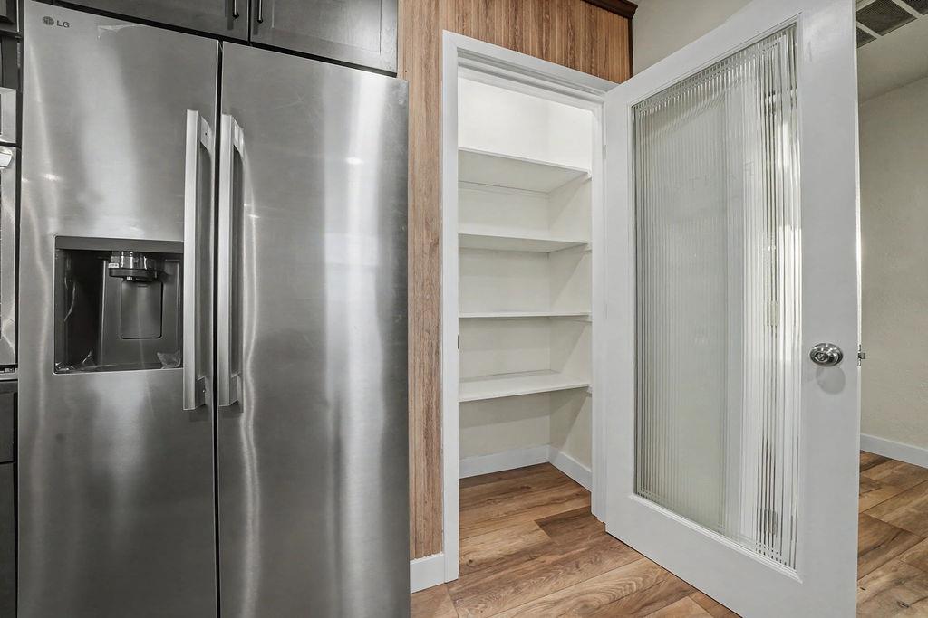 155 Foothill Drive Sutter Creek, CA 95685 - Photo 33 of 84 a view of a refrigerator in a kitchen