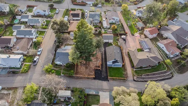 an aerial view of balcony and yard