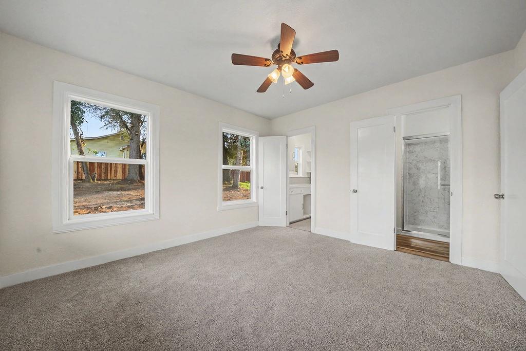 155 Foothill Drive Sutter Creek, CA 95685 - Photo 5 of 84 a view of an empty room with a window