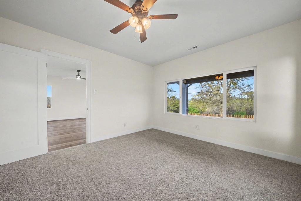 155 Foothill Drive Sutter Creek, CA 95685 - Photo 7 of 84 a view of an empty room with a window