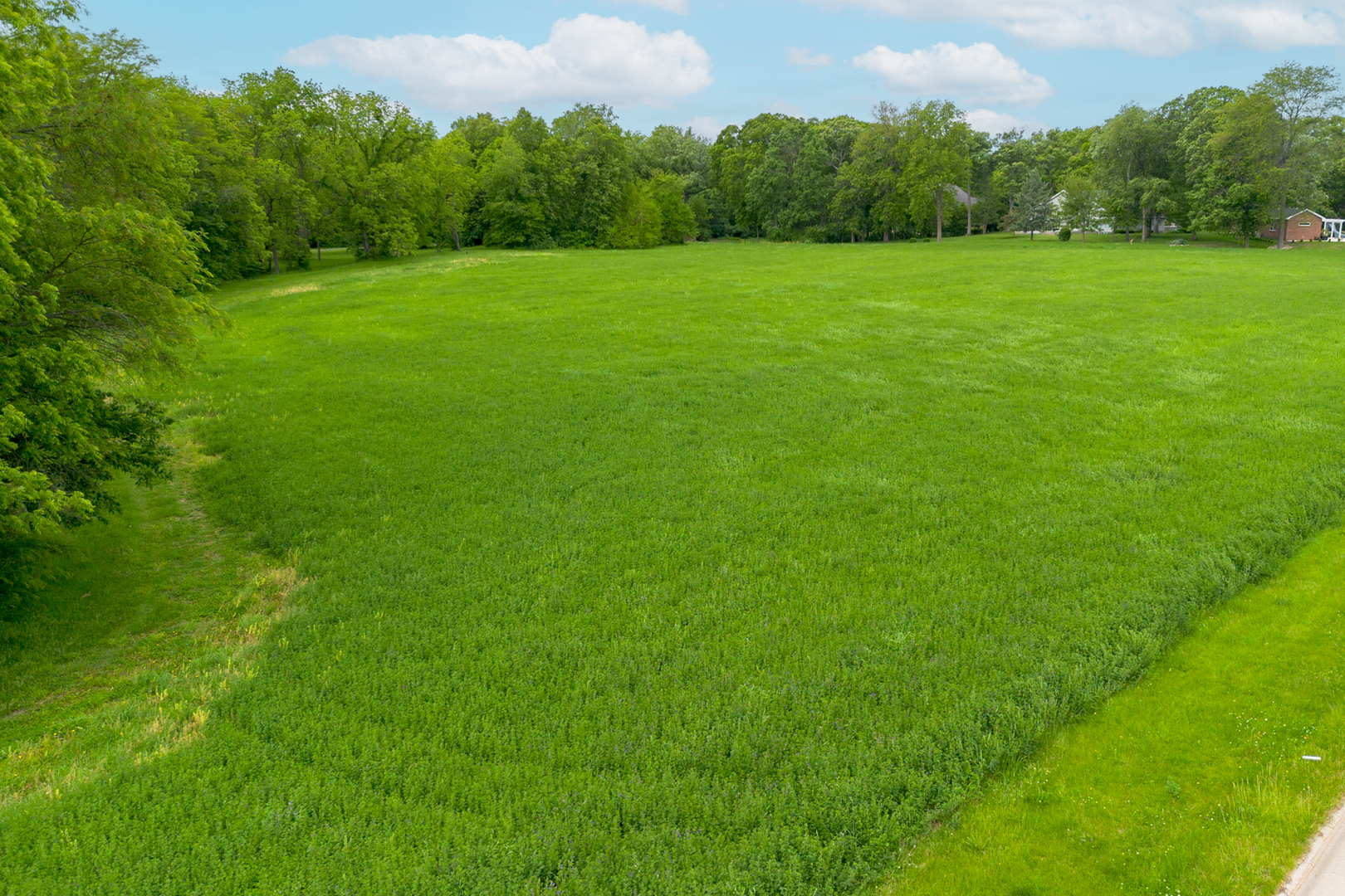 698 North 2853rd Road LaSalle, IL 61301 - Photo 31 of 39 a view of a green field with wooden fence