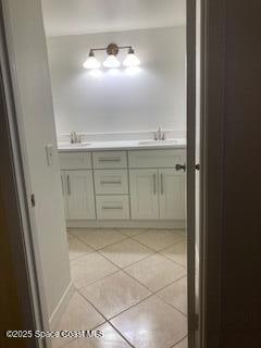 4612 Kaileen Circle Northeast Palm Bay, FL 32905 - Photo 4 of 8 a view of a bathroom with mirror and window