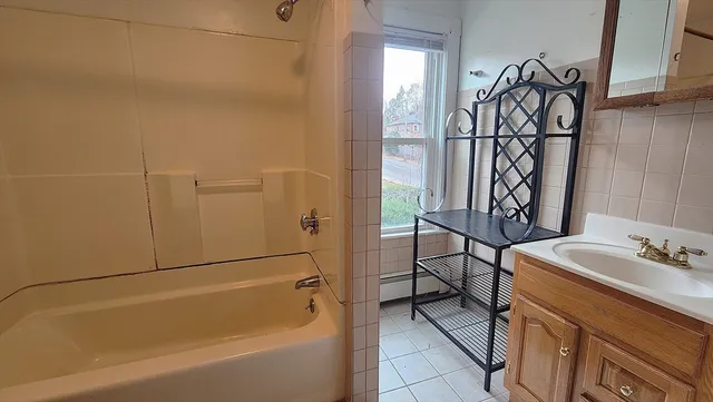 a bathroom with a sink and a bathtub
