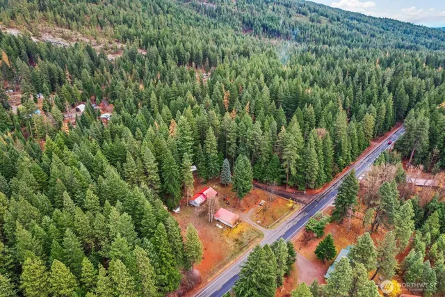 front view of a house with a tree