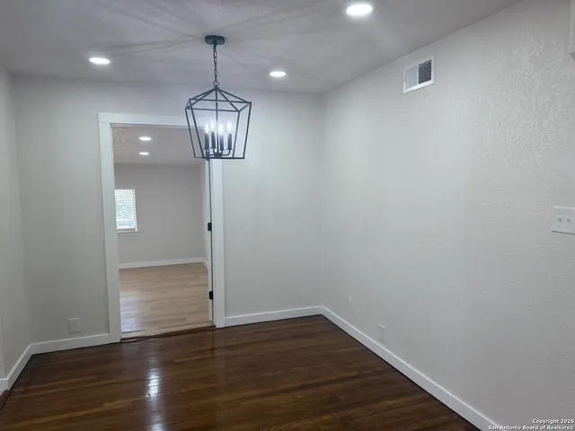 a kitchen with a sink stove and microwave