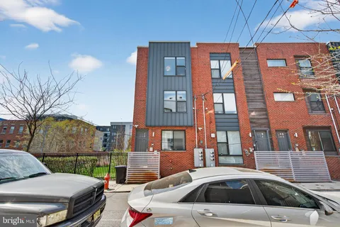 a view of a white building and outdoor space