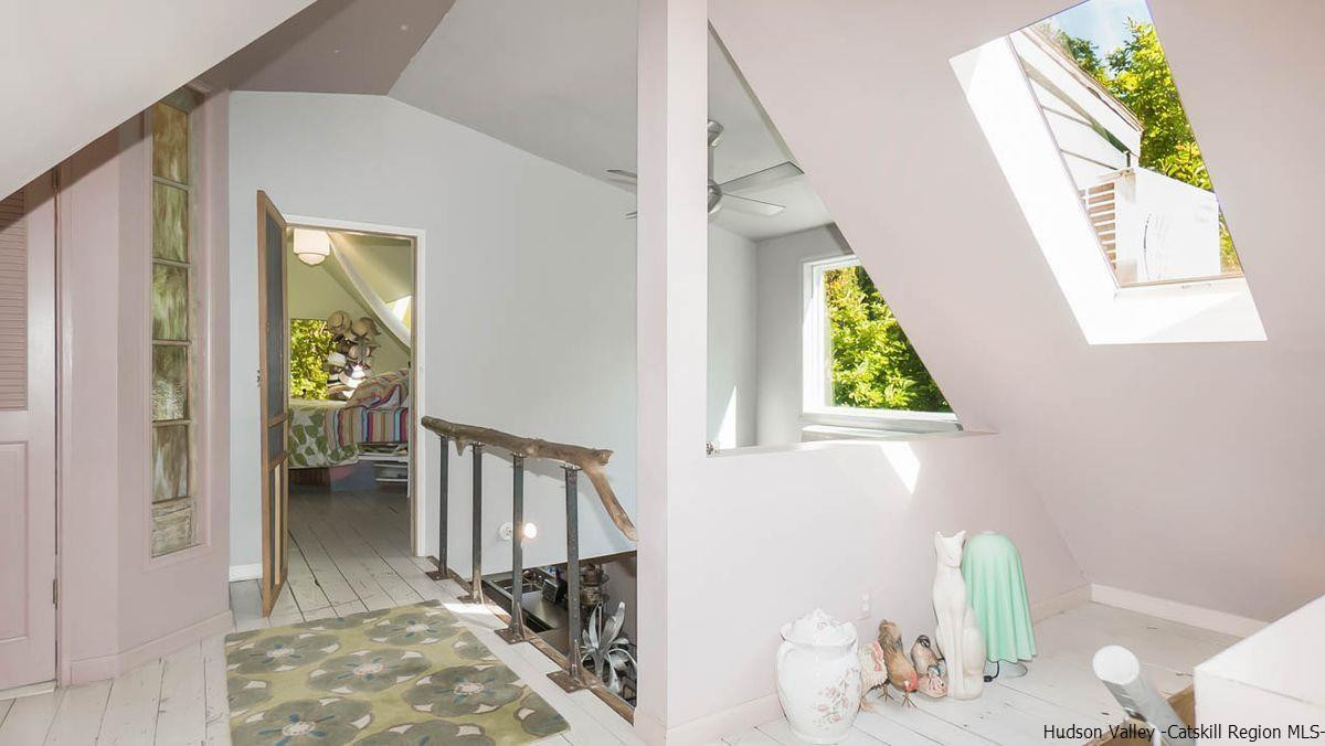286 Rochester Center Road Kerhonkson, NY 12446 - Photo 13 of 34 a view of hallway with livingroom and stairs