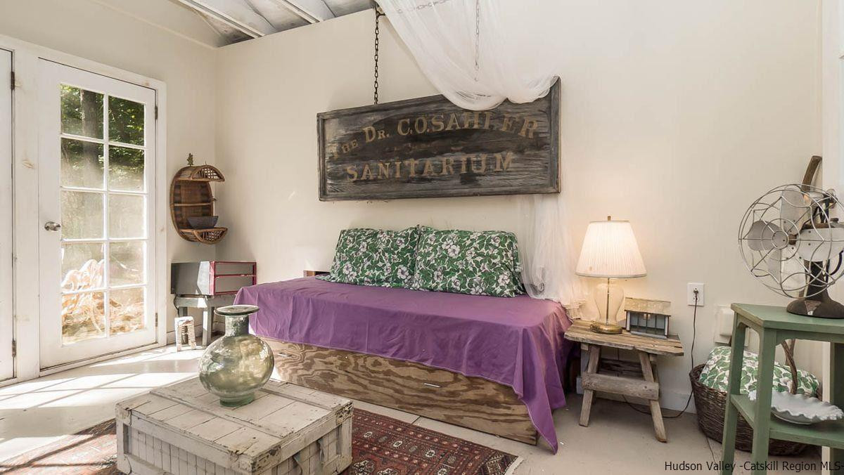 286 Rochester Center Road Kerhonkson, NY 12446 - Photo 19 of 34 a bedroom with furniture and a window