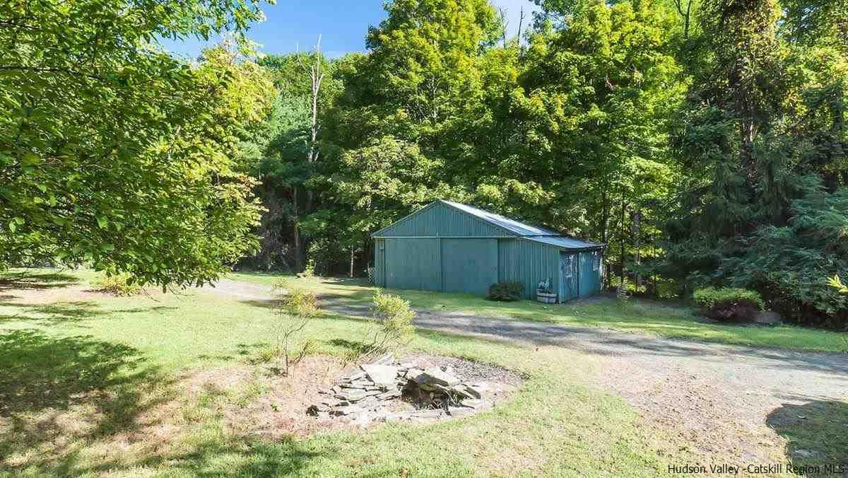 286 Rochester Center Road Kerhonkson, NY 12446 - Photo 20 of 34 a fire hydrant in the middle of a field
