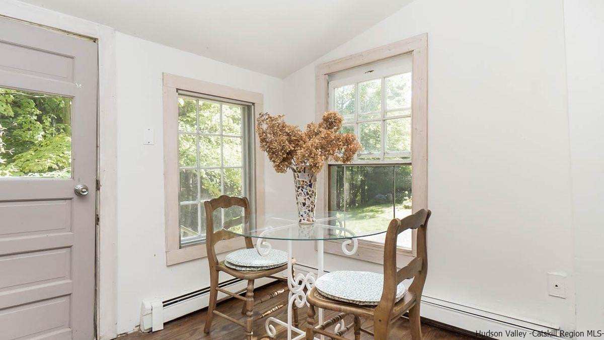 286 Rochester Center Road Kerhonkson, NY 12446 - Photo 25 of 34 a view of a dining room with furniture window and outside view